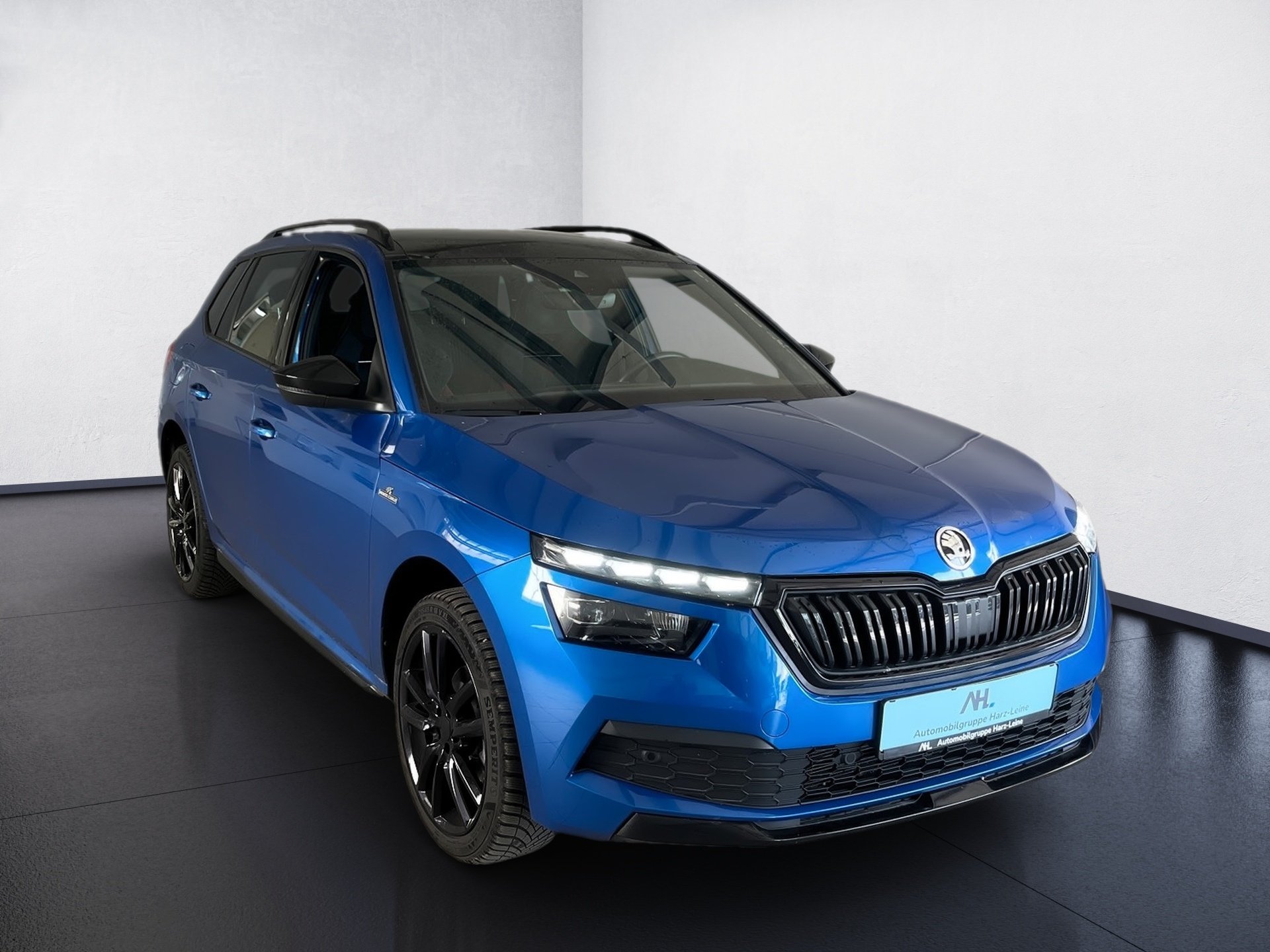 Kamiq MONTE CARLO TSI DSG+ALU 18+AHK+PANO+ACC+NAVI+LED+RÜCKFAHRKAMERA+SIDE ASS