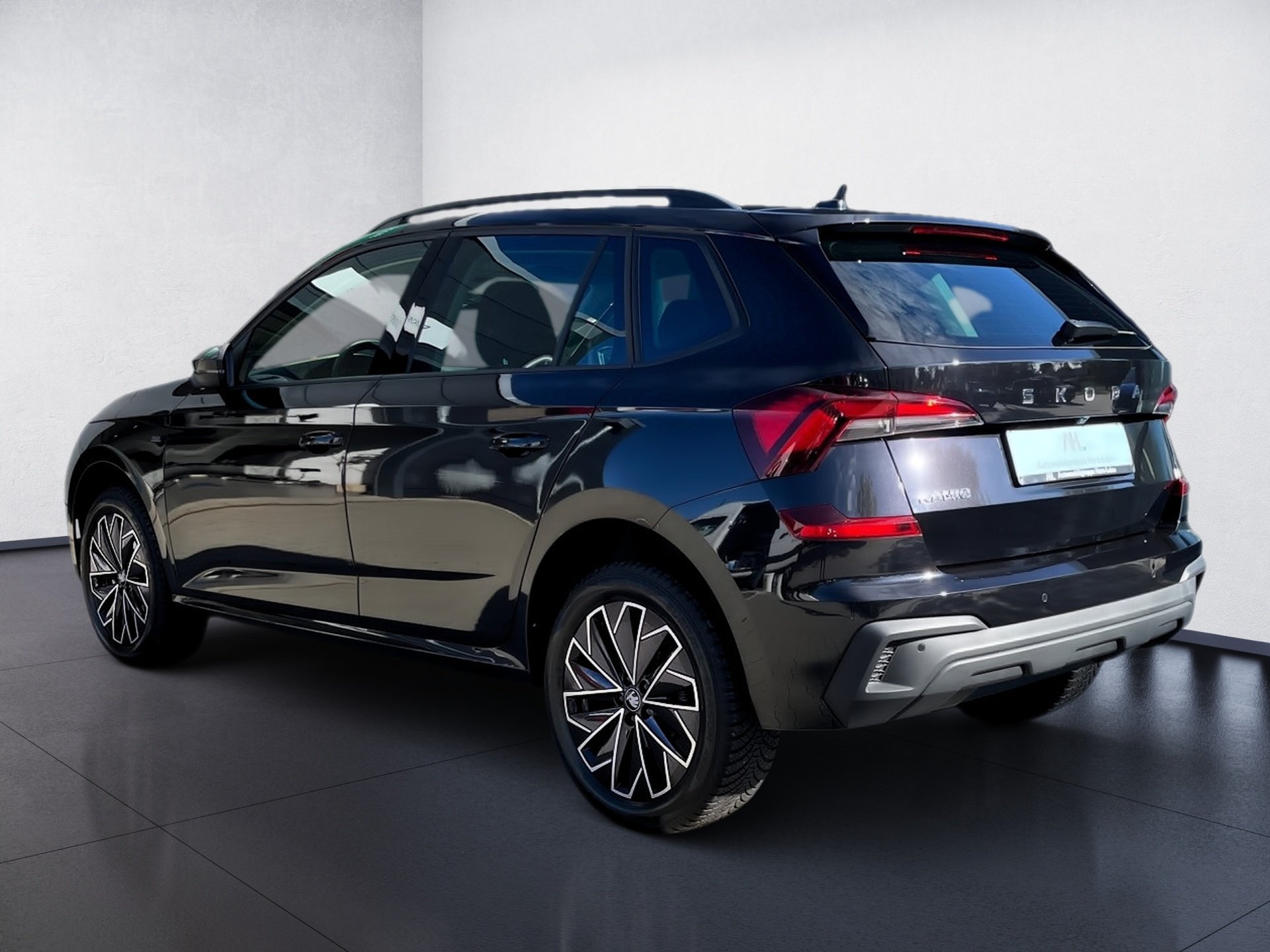 Kamiq 1.0 TSI Tour DSG AHK Matrix Navi ACC RFK Optik schwarz