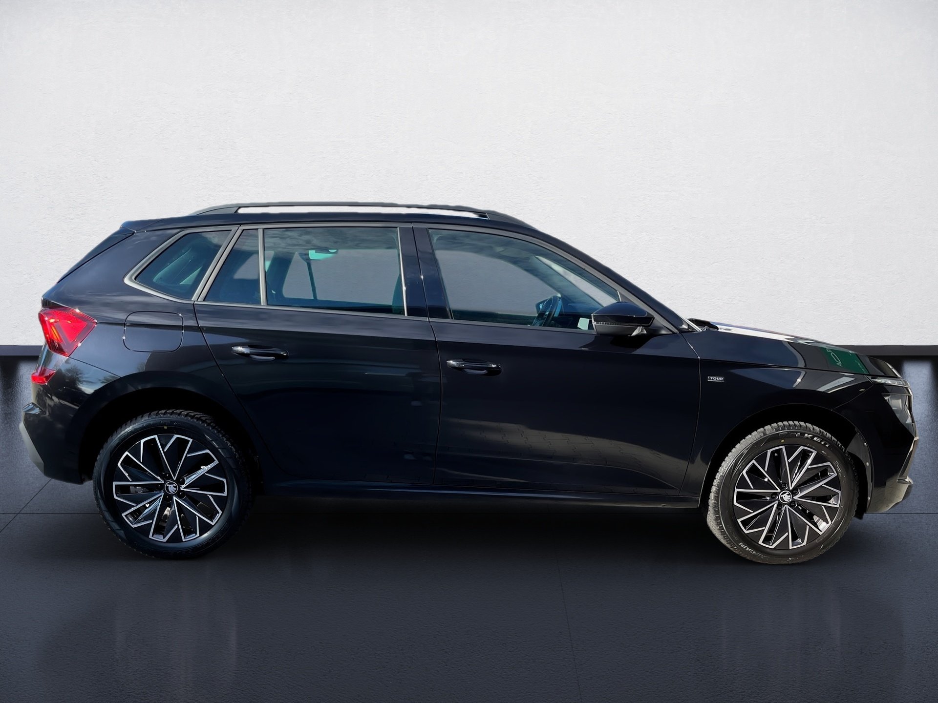 Kamiq 1.0 TSI Tour DSG AHK Matrix Navi ACC RFK Optik schwarz
