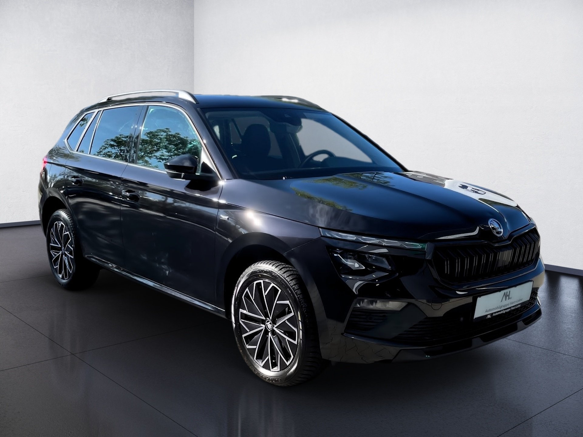 Kamiq 1.0 TSI Tour DSG AHK Matrix Navi ACC RFK Optik schwarz